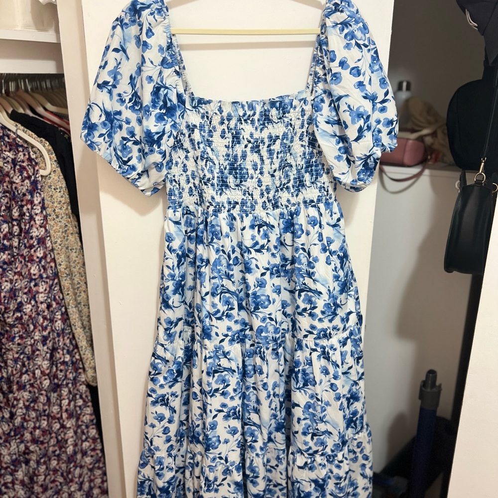 Blue and white floral dress. Smocked top and puff sleeves.